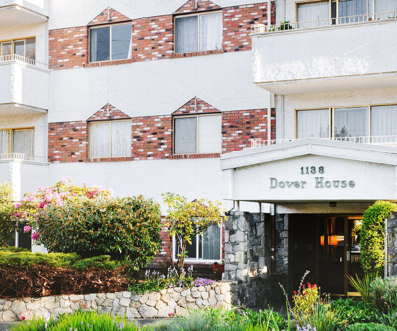 The exterior entrance of an apartment building
